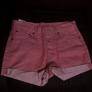 Pink Denim Levi shorts.